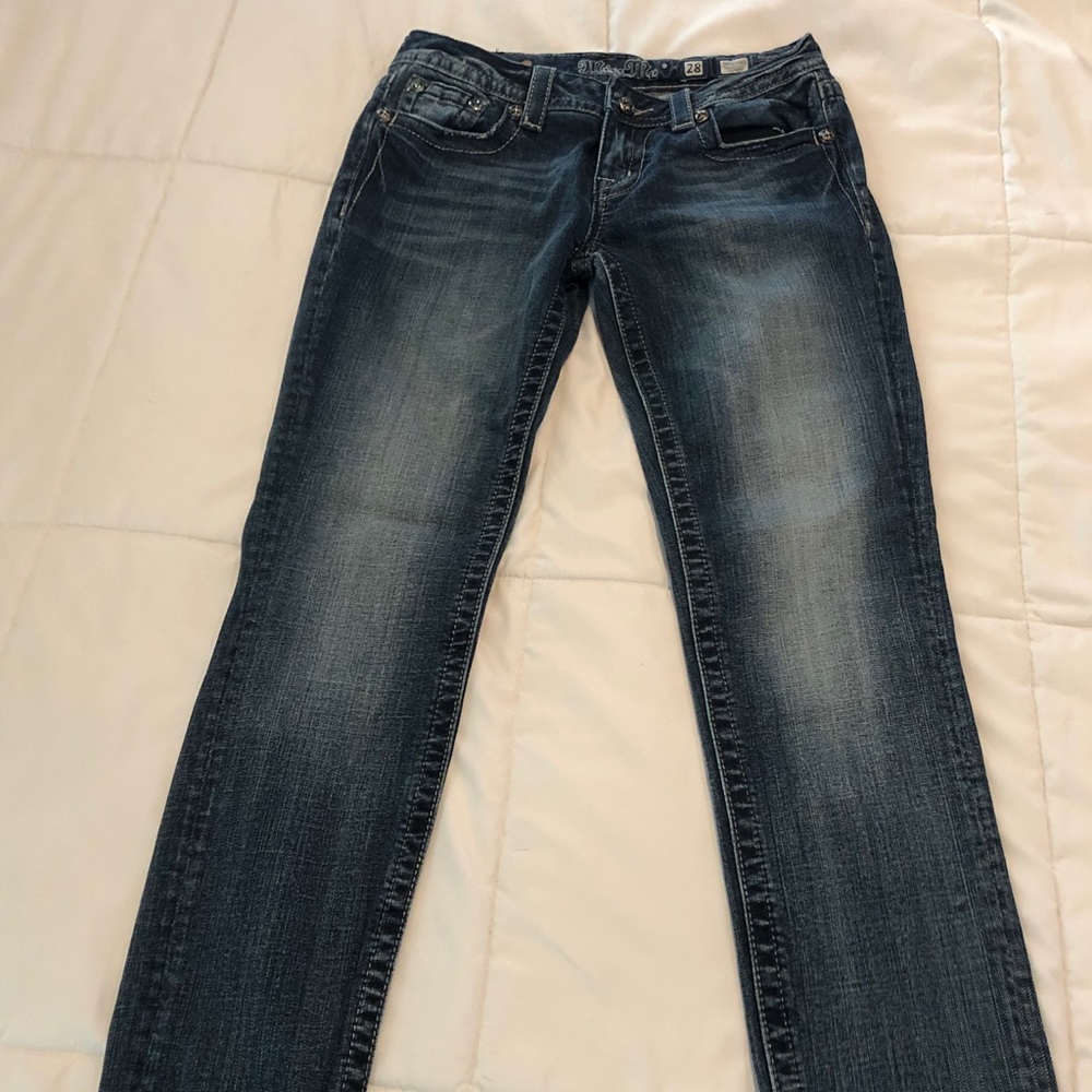 Miss Me Jean, “Cross” embezzlement on back pockets